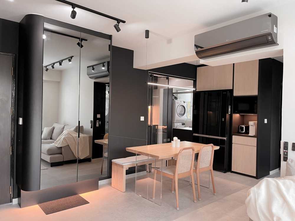 Scandinavian Foyer with Mirror and Open Kitchen