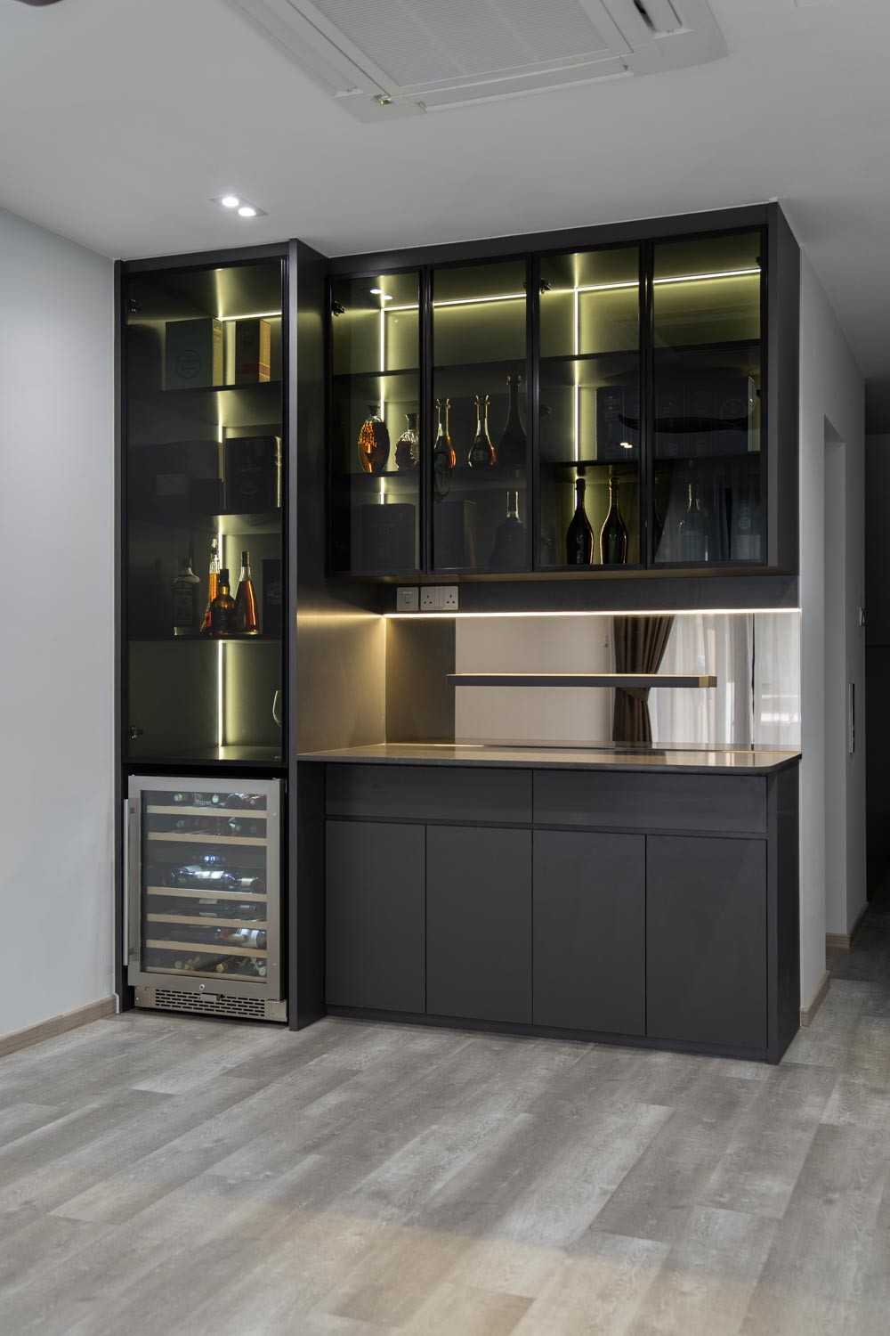 Contemporary Wine Cellar with Drinkware and Shelving Units