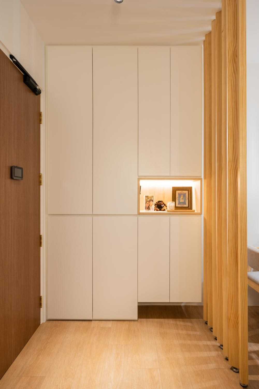 Minimalist Entryway with Shoe Rack and Small Storage