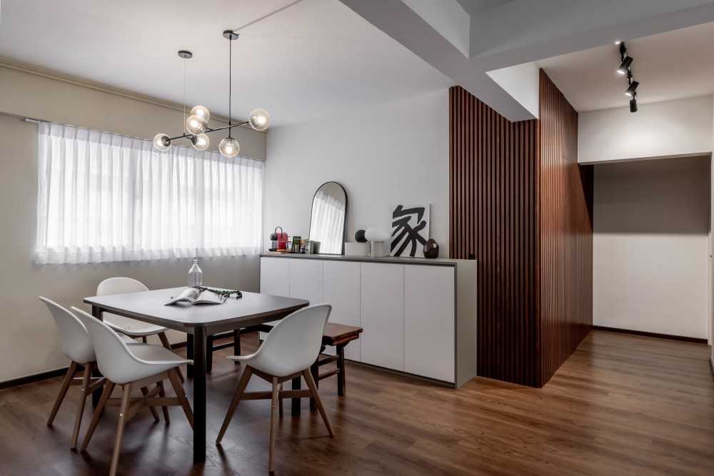 Scandinavian Dining Room with Feature Wall and Ceiling Light