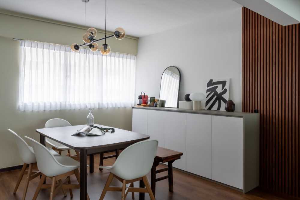 Scandinavian Dining Room with Ceiling Light and Dining Table