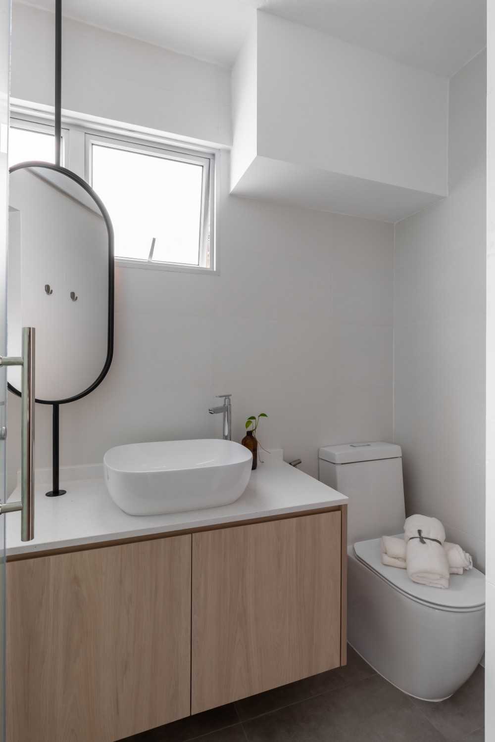 Scandinavian Bathroom with Granite Floor and Mirror