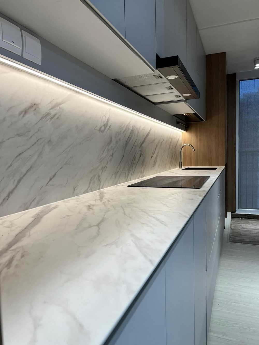 Scandinavian Kitchen with Cement Floor and Granite Floor