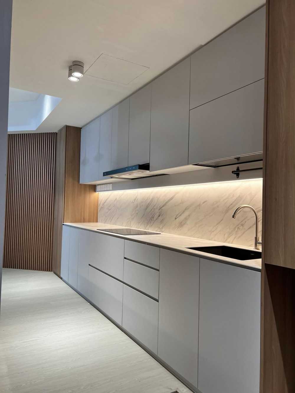 Scandinavian Kitchen with Herringbone Tiling and Cement Floor