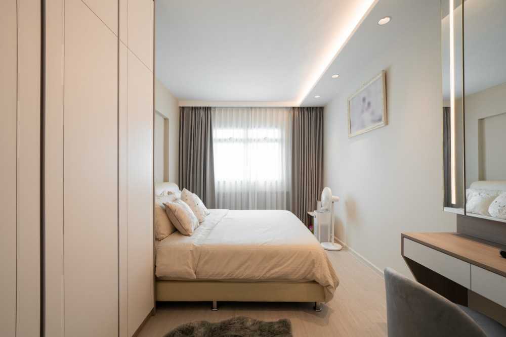 Modern Bedroom with Herringbone Tiling and Wood Flooring