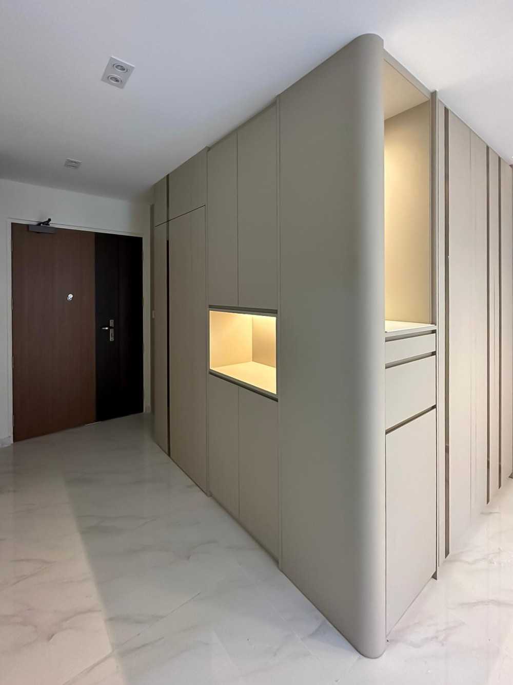 Scandinavian Foyer with Paintings and Storage Cabinets