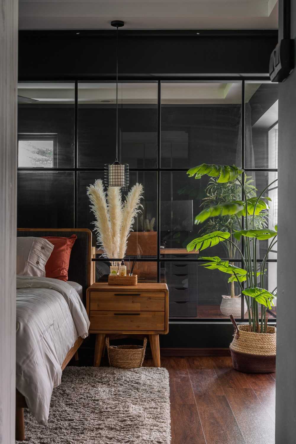 Scandinavian Bedroom with Wood Flooring and Bedside Table