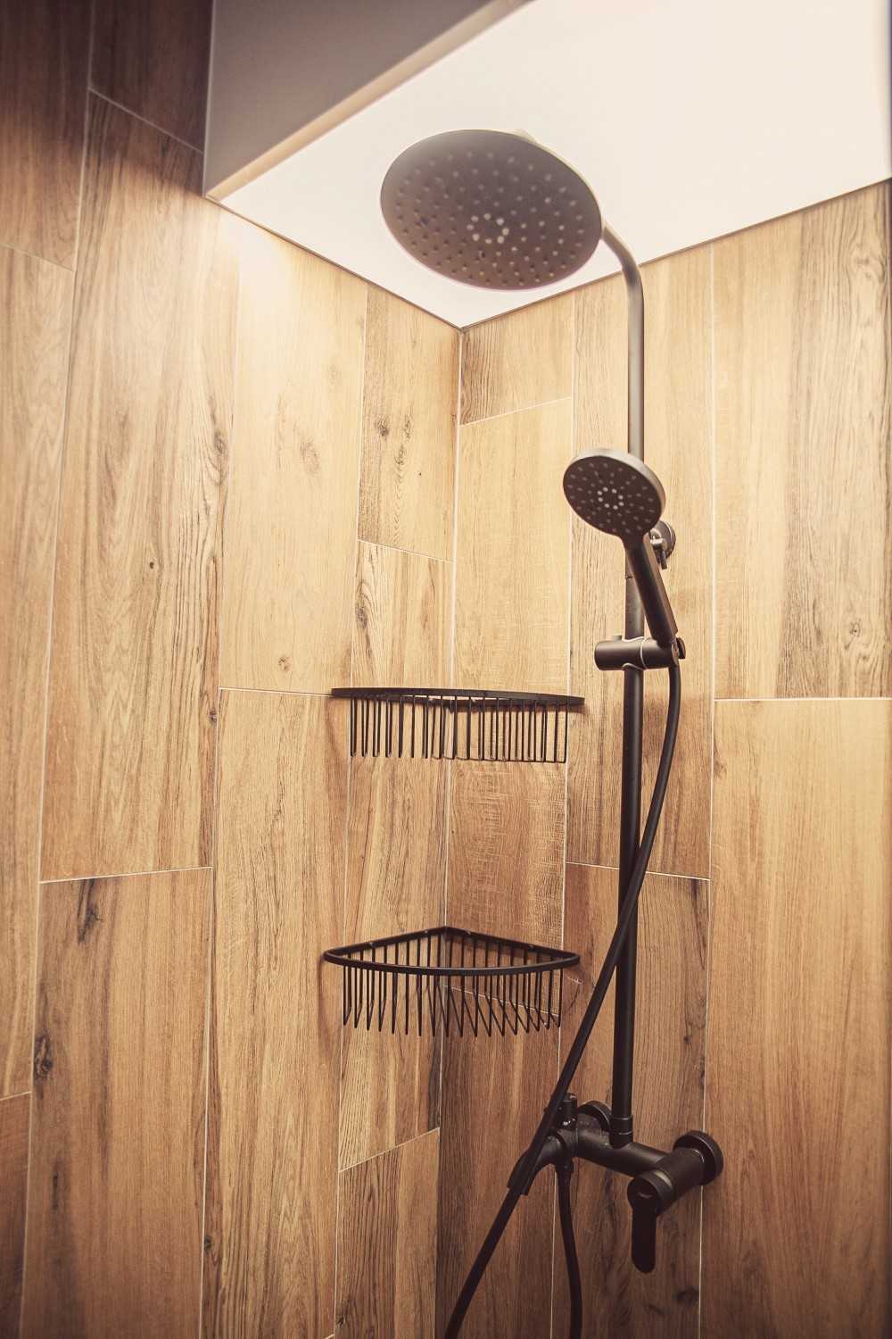 Scandinavian Bathroom with Wood Flooring and Rainshower