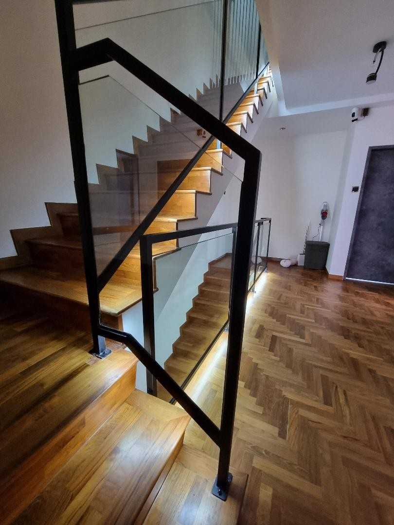 Eclectic Hallway with Bookshelf and Artwork