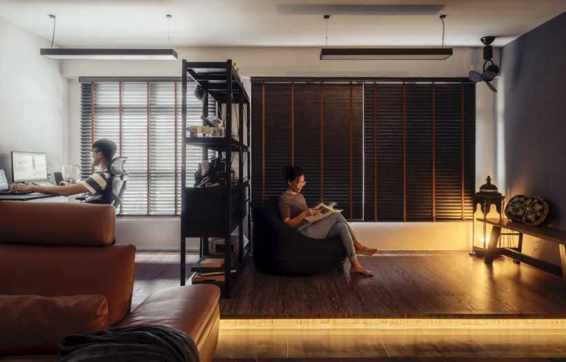 Industrial Living Room with Homogeneous Tiles and Cove Lighting