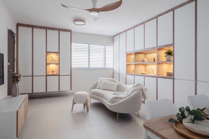 Modern Living Room with Bookshelf and Homogeneous Tiles
