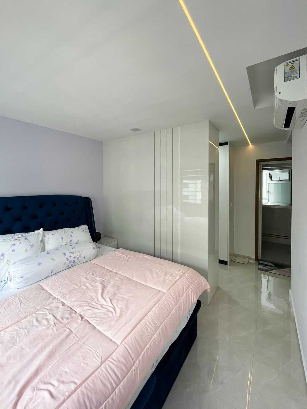 Scandinavian Bedroom with Wardrobe and Paintings