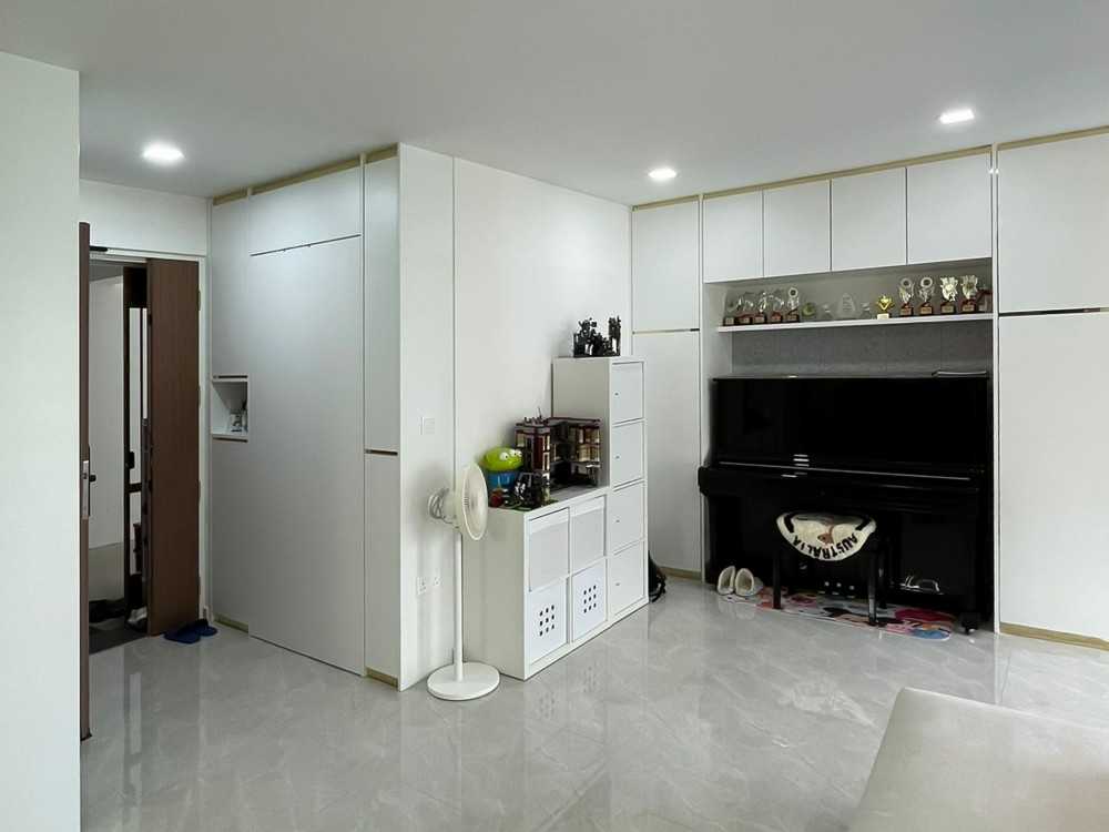 Scandinavian Foyer with Paintings and Storage Cabinets
