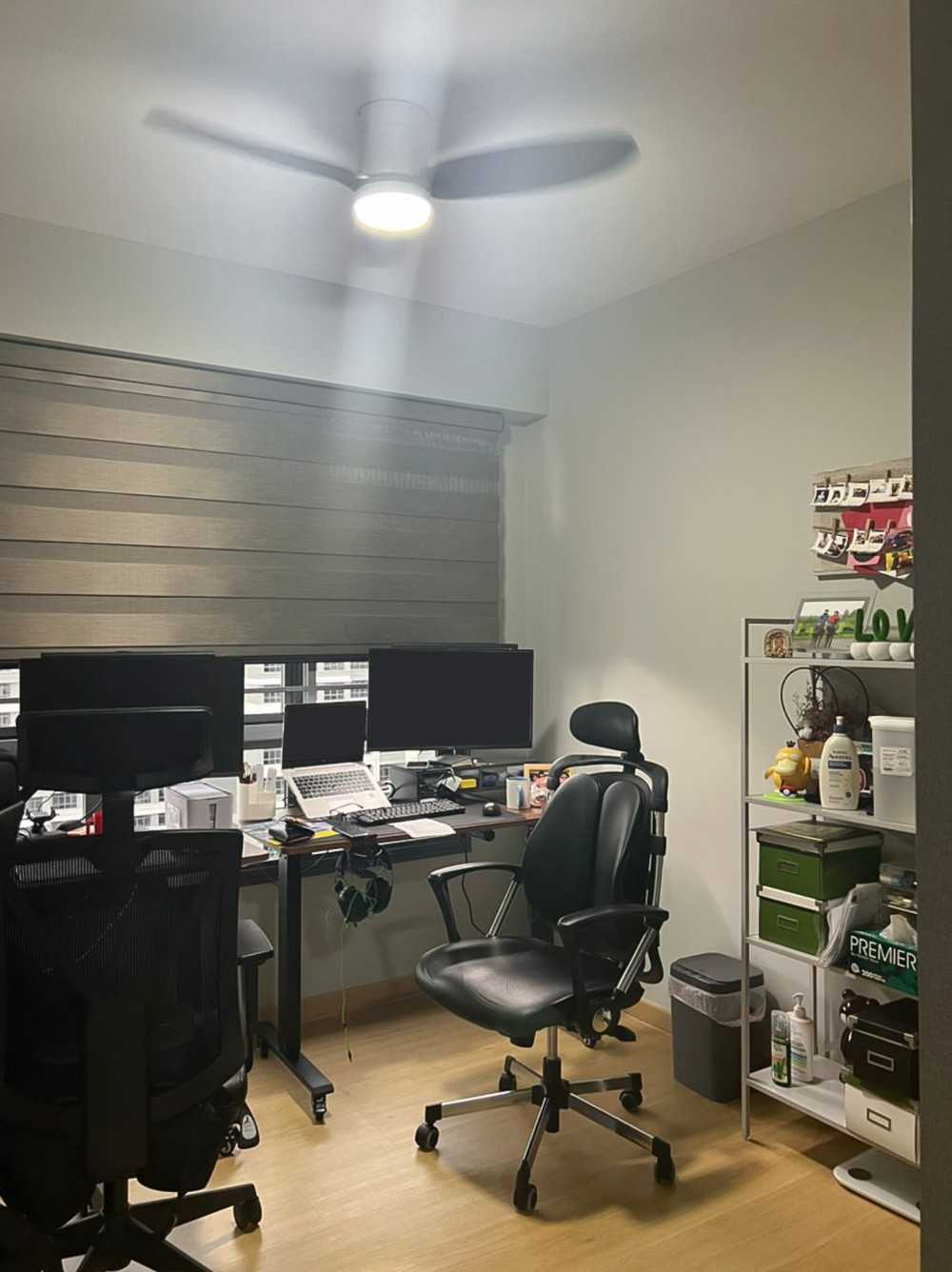 Scandinavian Study with Window Shutters and Paintings