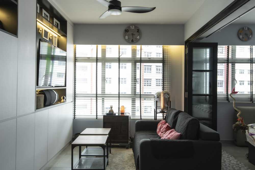 Modern Living Room with Bookshelf and Feature Wall