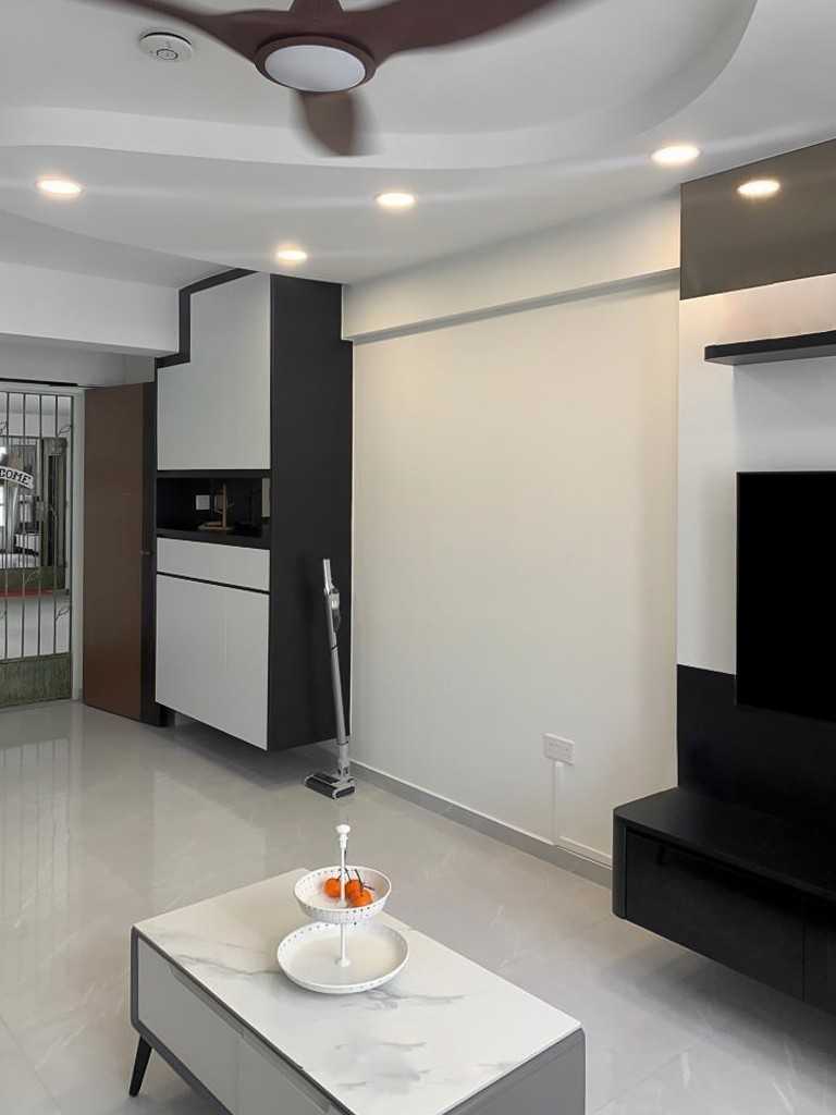 Scandinavian Foyer with Paintings and Storage Cabinets