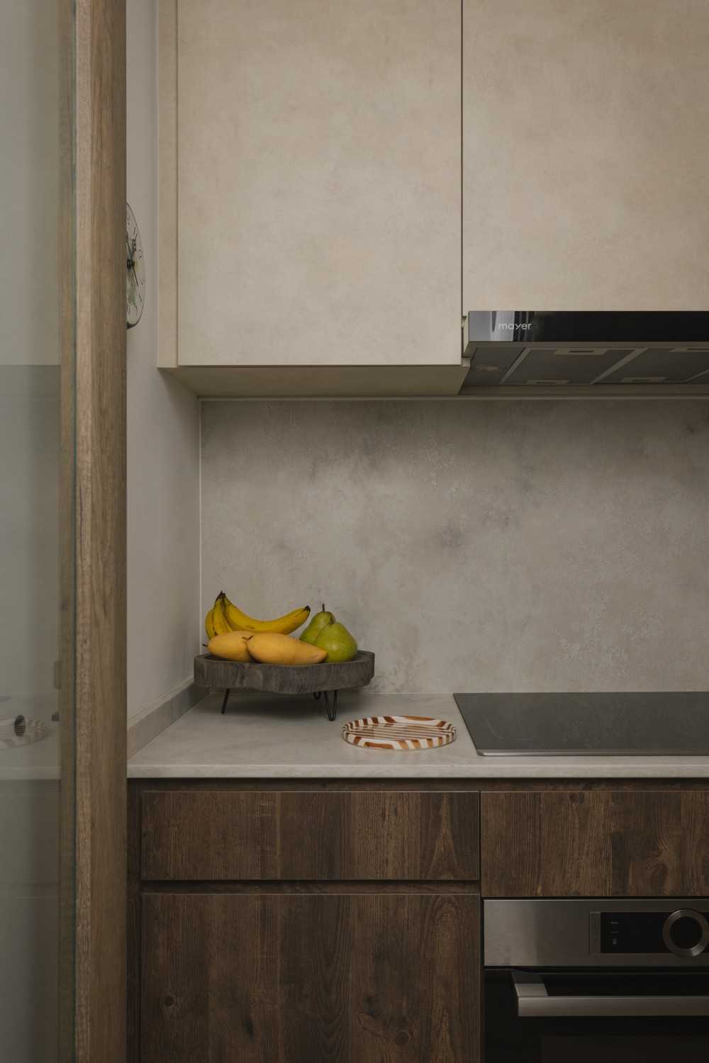 Minimalist Kitchen with Cupboard and Breakfast Counter