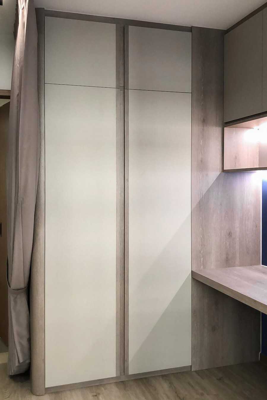 Scandinavian Bedroom with Wardrobe and Paintings