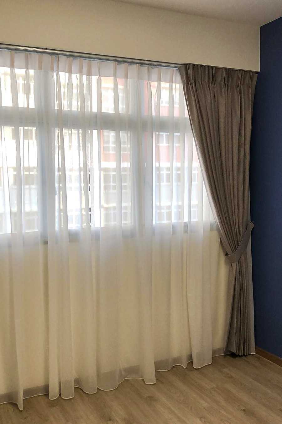 Scandinavian Living Room with Window Grille and Paintings
