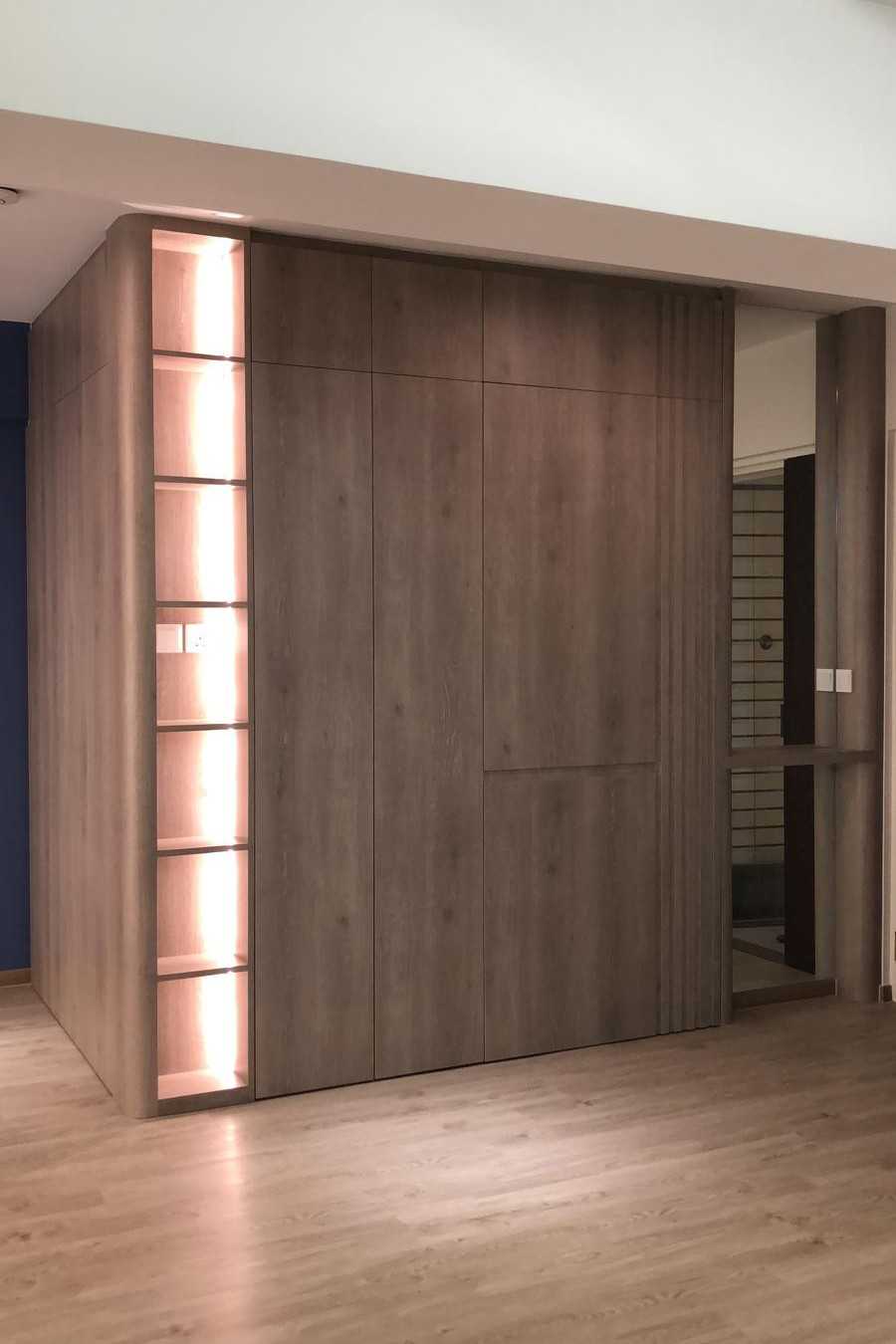 Scandinavian Foyer with Paintings and Storage Cabinets