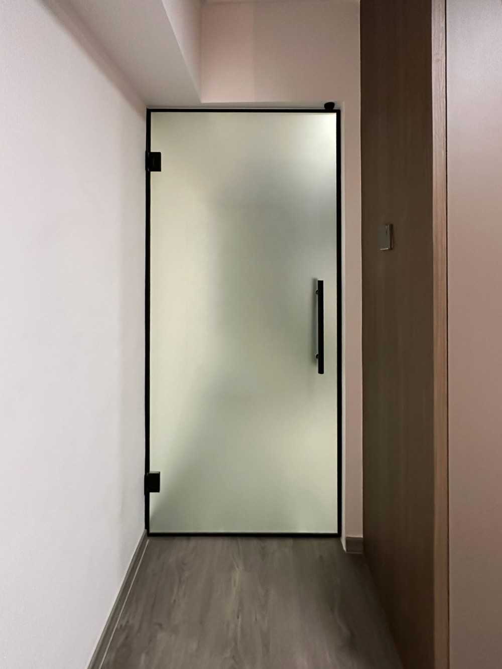 Scandinavian Bedroom with Glass Door and Paintings