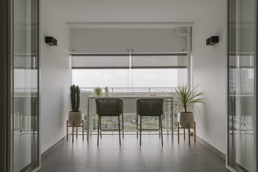Modern Balcony with Window Shutters and Outdoor Table