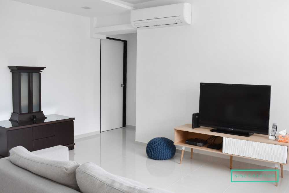 Minimalist Living Room with Homogeneous Tiles and TV Console