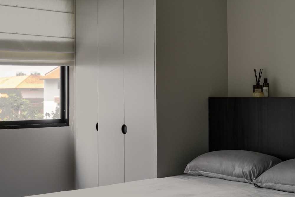 Minimalist Bedroom with Wardrobe and Bed