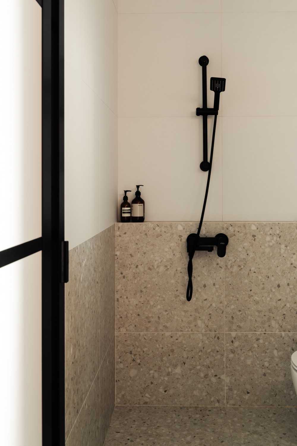 Minimalist Bathroom with Bathroom Accessories and Showers