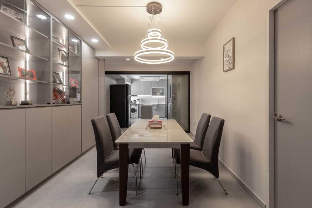 Minimalist Dining Room with Drop Light and Dining Table