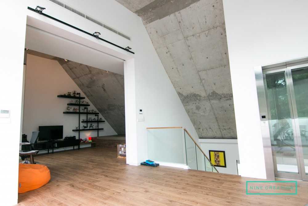 Contemporary Bedroom with Parquet Floor and Wood Flooring
