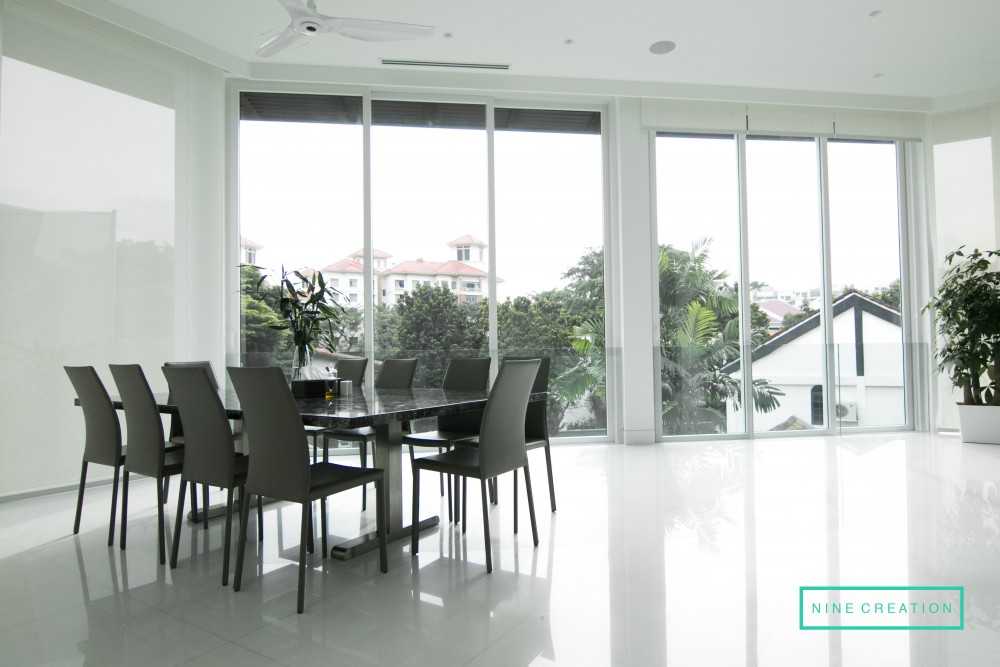 Contemporary Dining Room with Drop Light and Dining Table