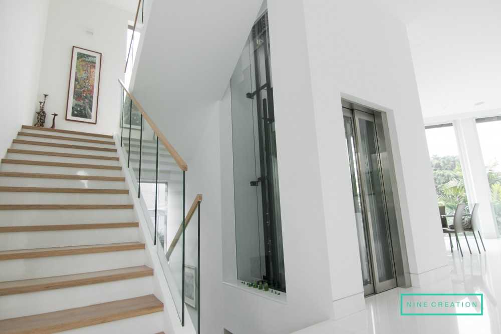 Contemporary Entryway with Mirror and Doors