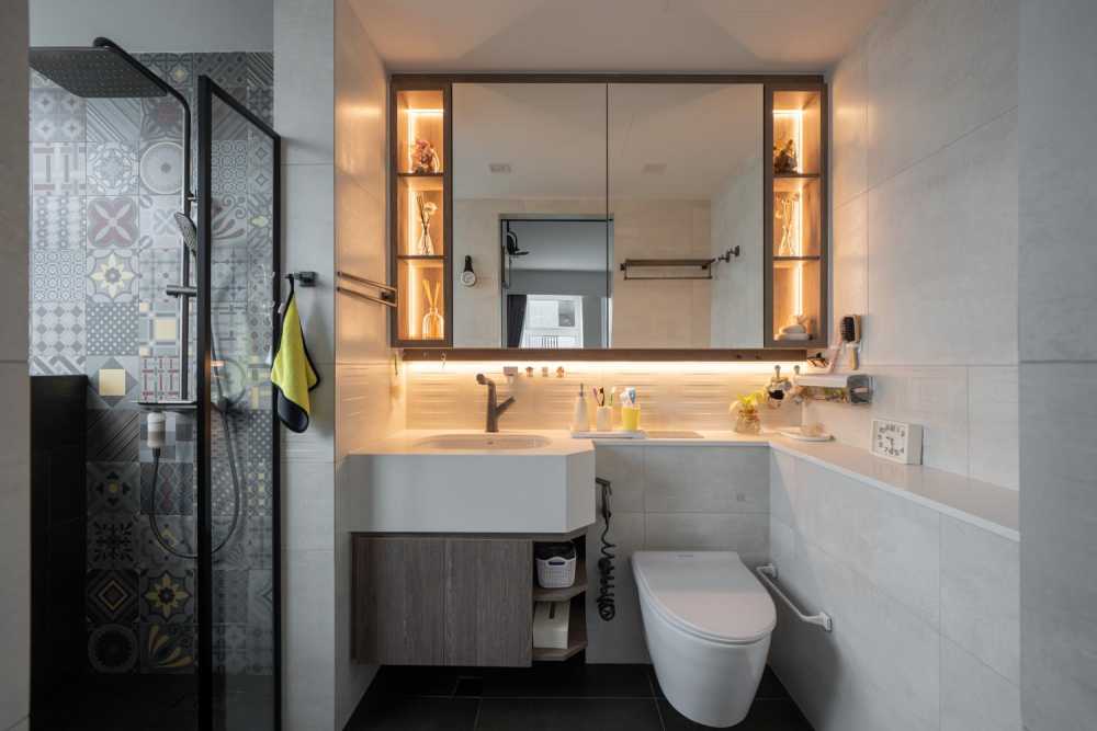 Modern Bathroom with Herringbone Tiling and Mirror
