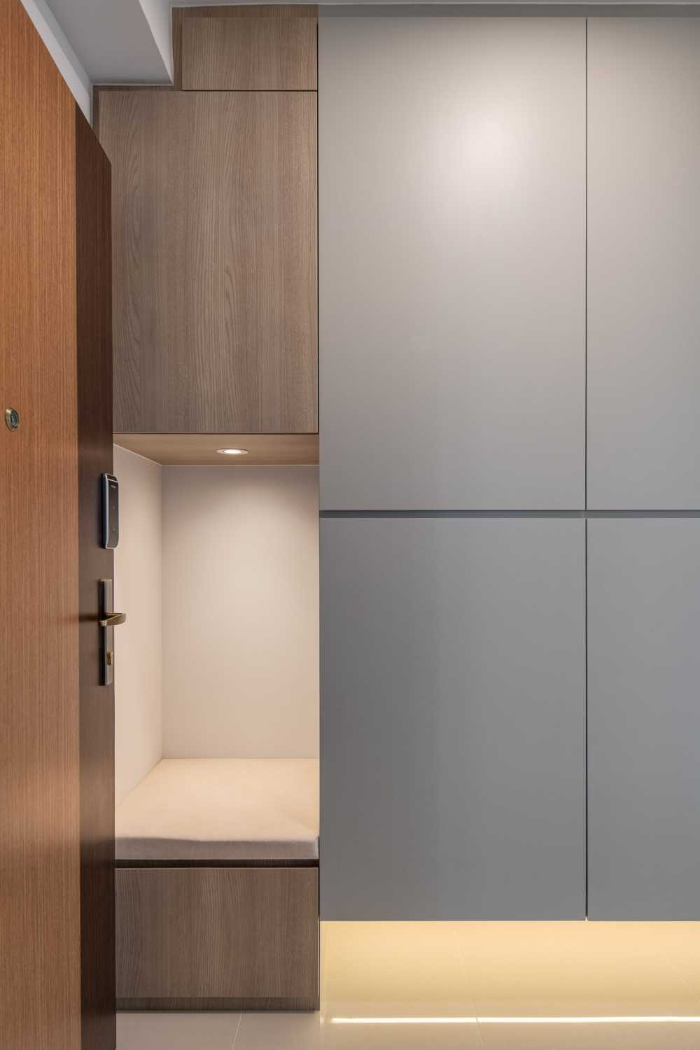 Minimalist Entryway with Shoe Rack and Storage Cabinets
