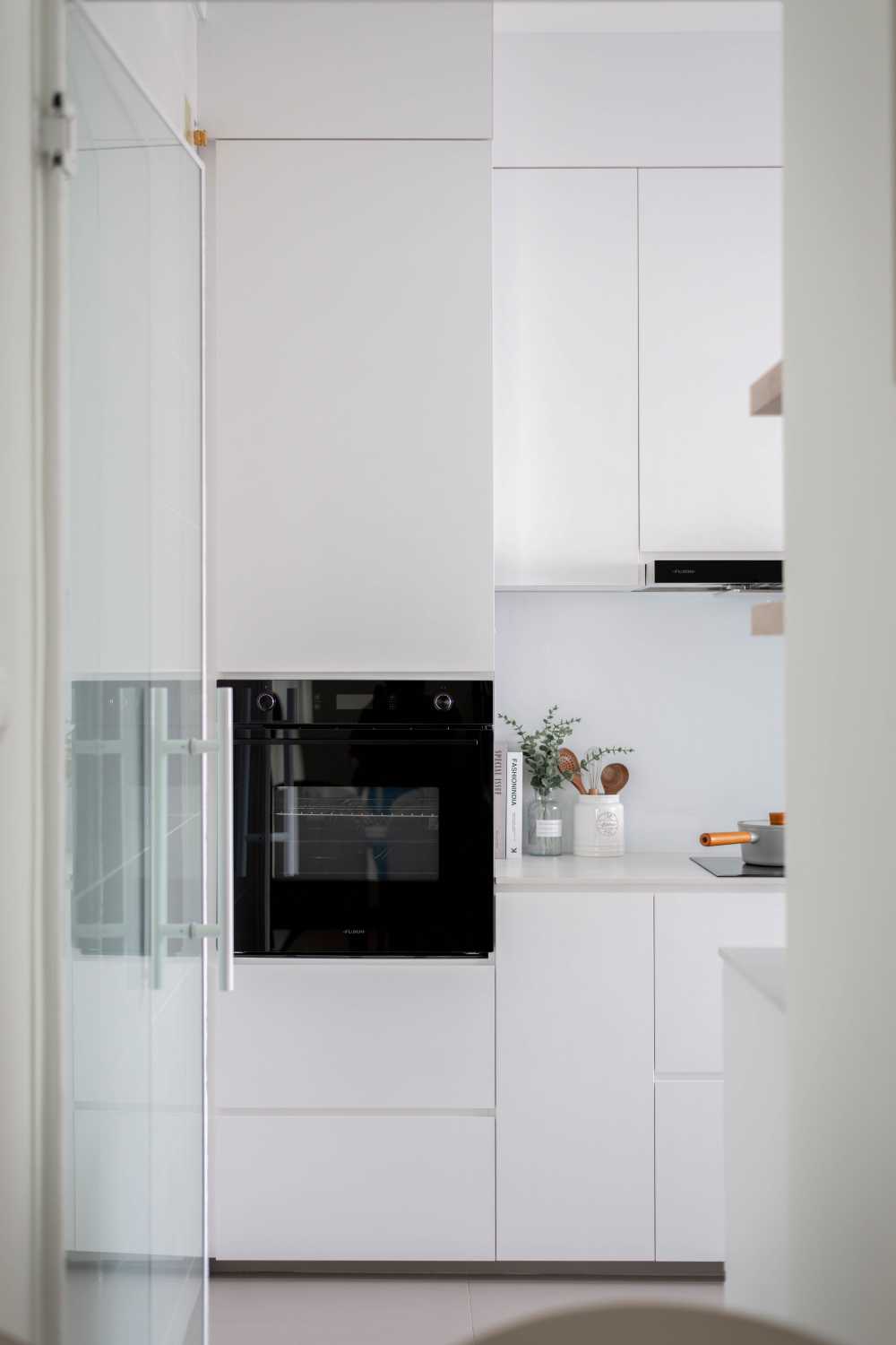 Scandinavian Kitchen with Cement Floor and Cupboard
