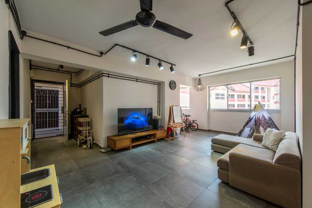 Industrial Living Room with Homogeneous Tiles and Cement Floor