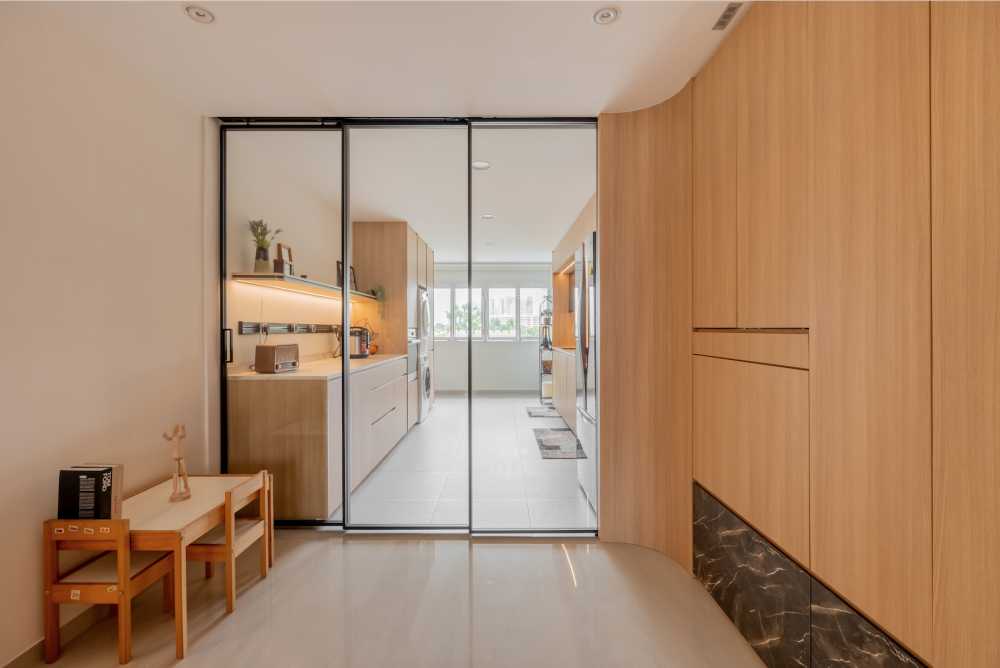 Scandinavian Entryway with Glass Door and Storage Cabinets