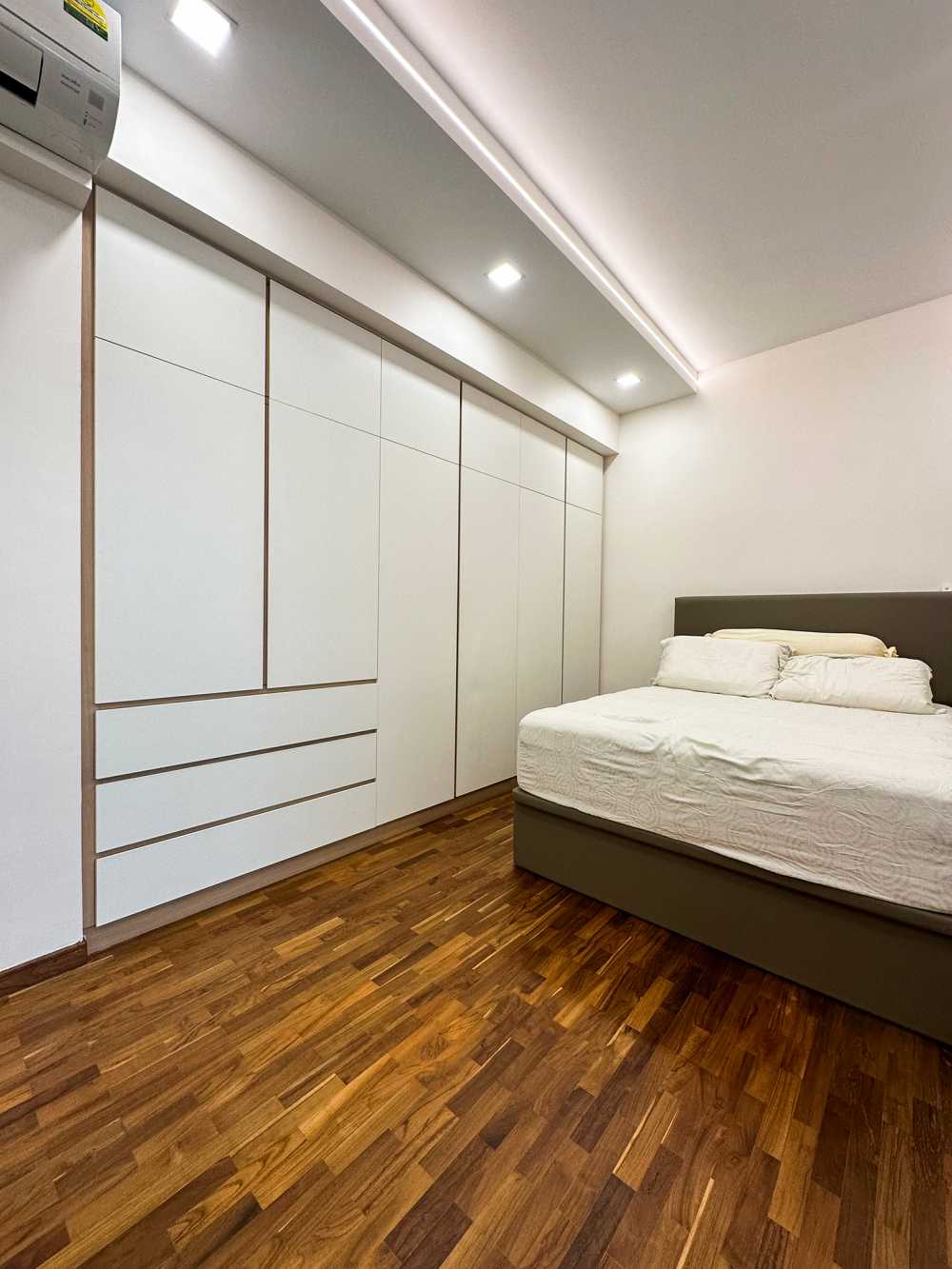 Scandinavian Bedroom with Wardrobe and Paintings