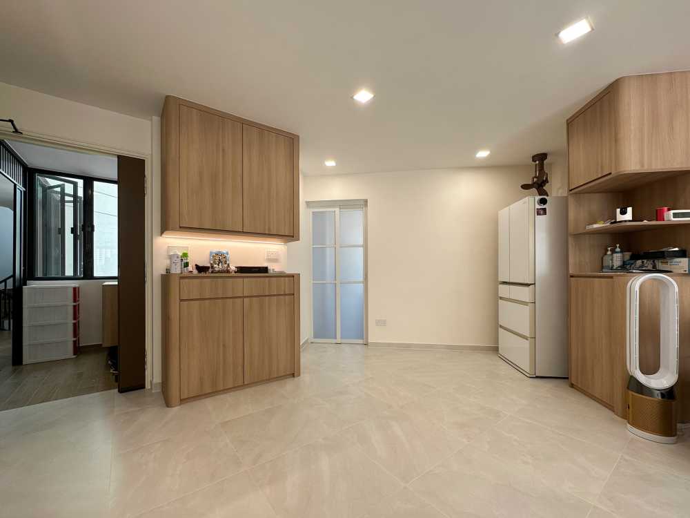 Scandinavian Foyer with Paintings and Storage Cabinets