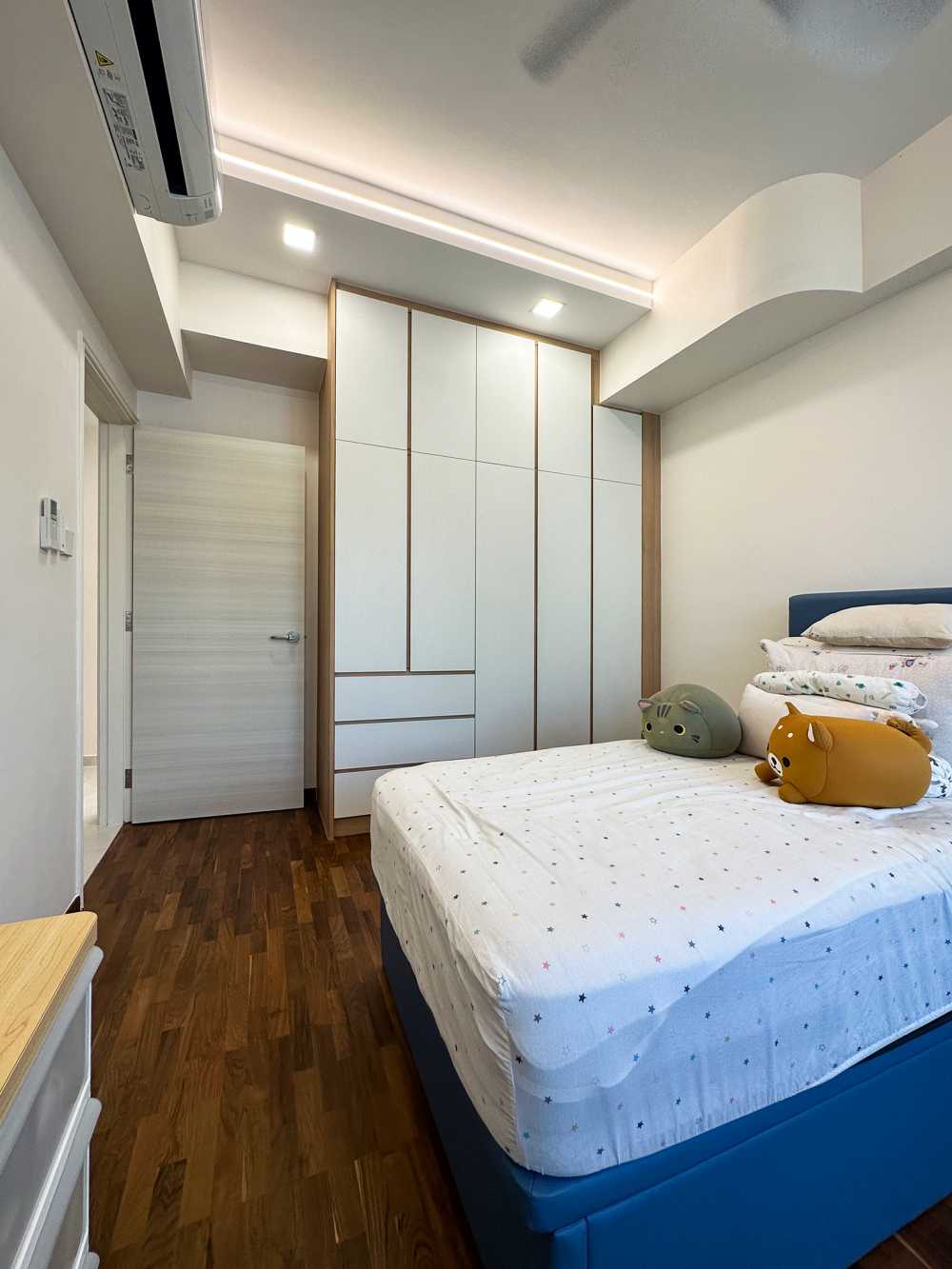 Scandinavian Bedroom with Wardrobe and Paintings