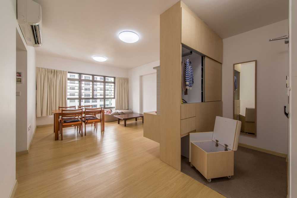 Scandinavian Living Room with Feature Wall and Shoe Cabinets
