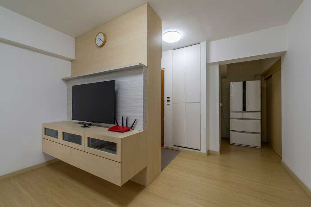 Scandinavian Living Room with Vinyl Flooring and Feature Wall