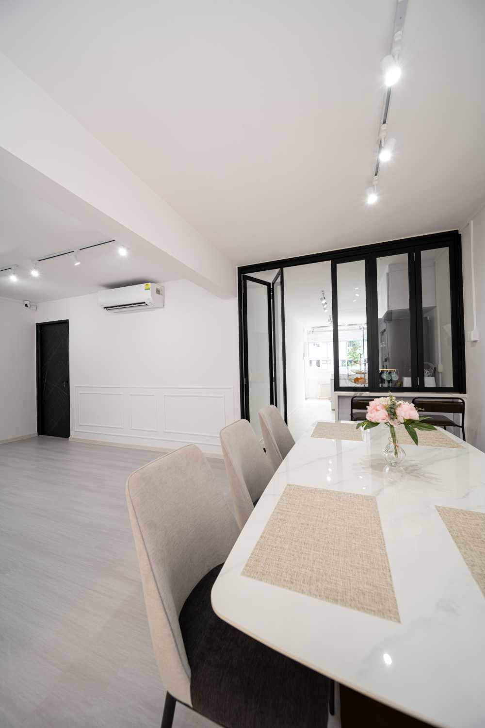 Scandinavian Dining Room with Drop Light and Cove Lighting