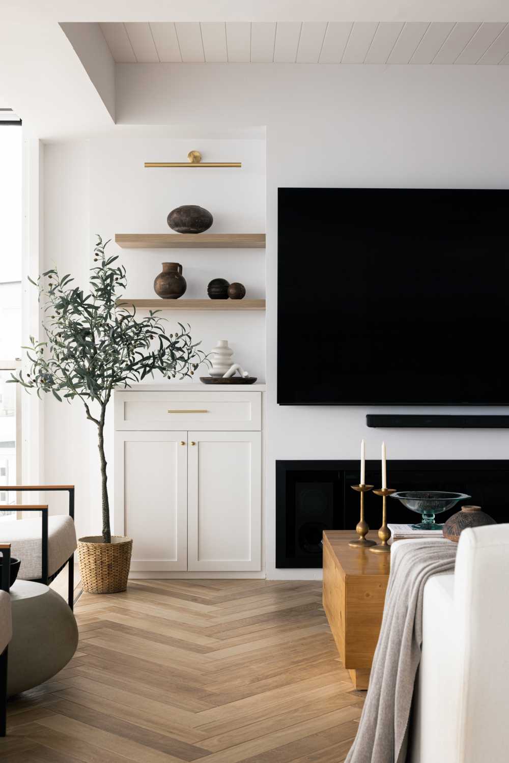 Modern Living Room with Herringbone Tiling and Sofa