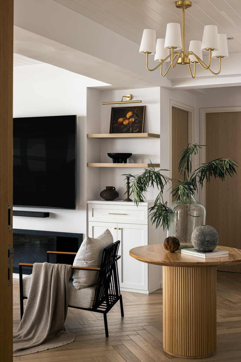 Modern Entryway with Herringbone Tiling and Chandelier