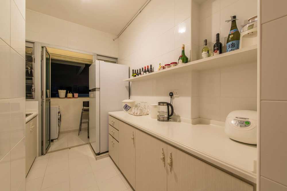 Country Kitchen with Countertop and Refrigerator