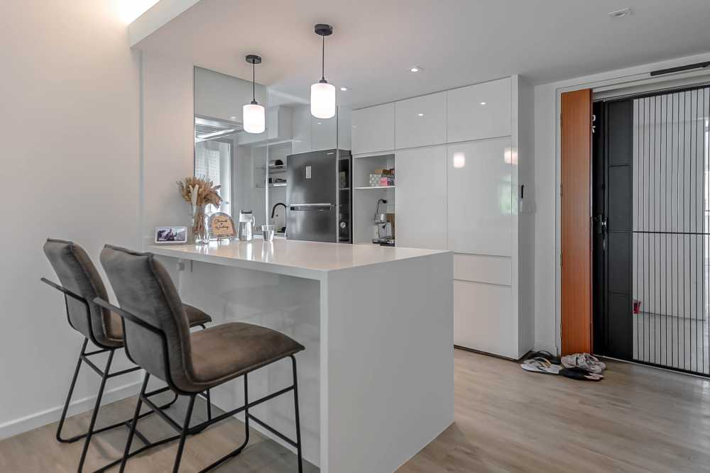 Minimalist Entryway with Storage Cabinets and Doors