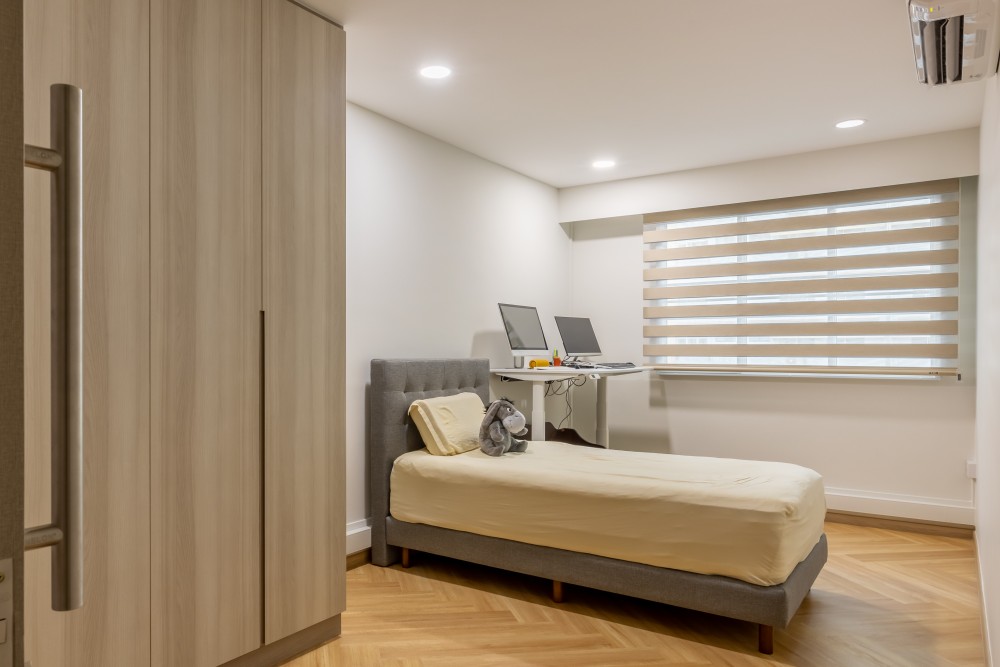 Minimalist Bedroom with Herringbone Tiling and Wardrobe