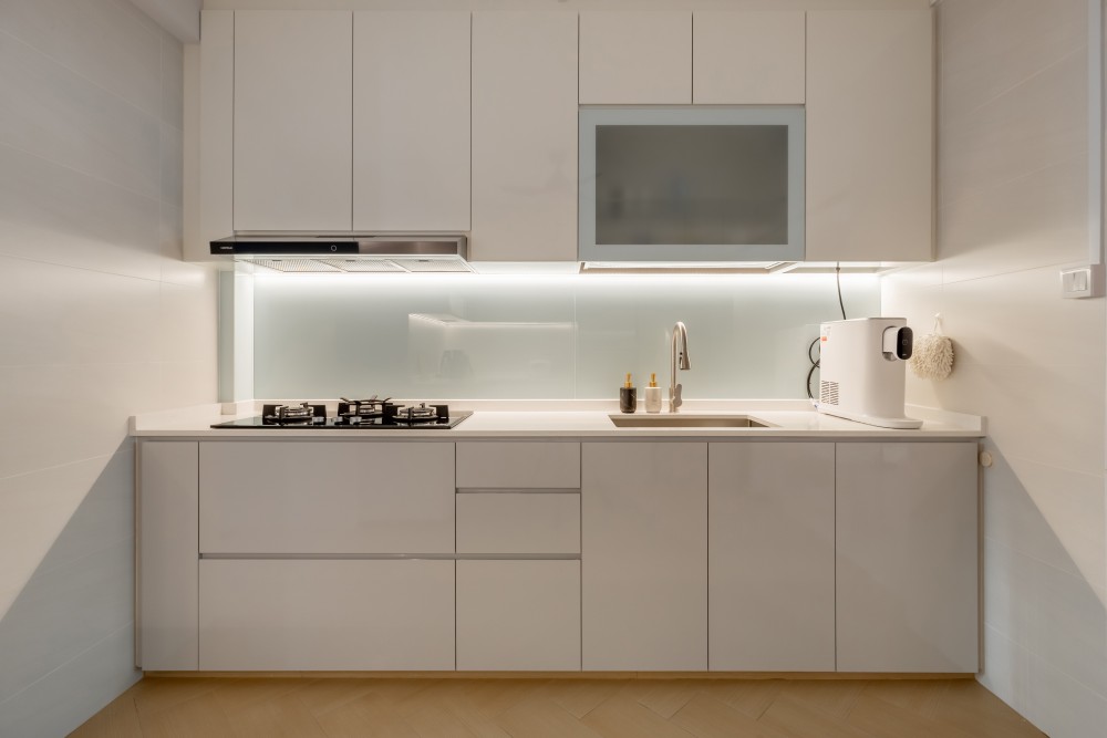 Minimalist Kitchen with Countertop and Herringbone Tiling